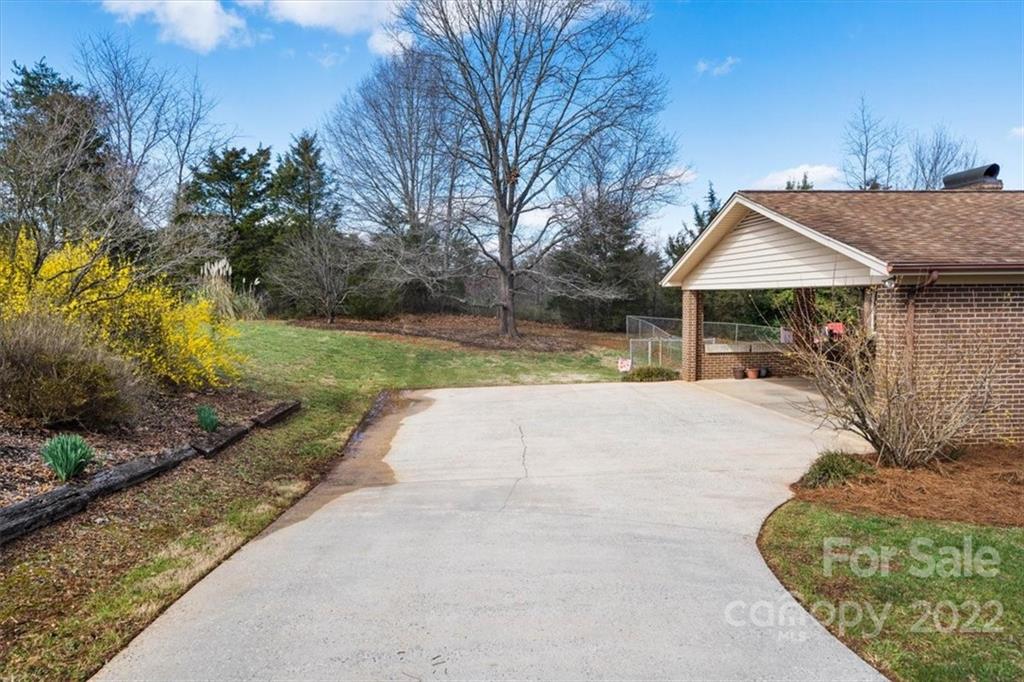 1552 Allen Lane Conover, NC 28613 - Photo 29 of 38 a view of a backyard with large trees