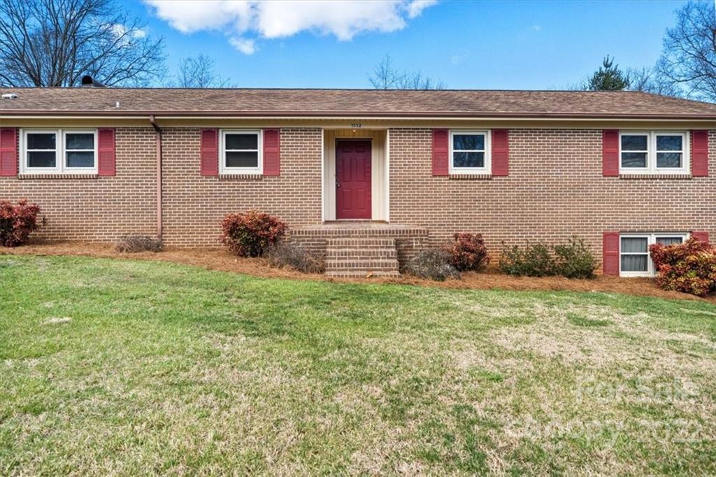 1552 Allen Lane Conover, NC 28613 - Photo 3 of 38 a front view of a house with garden
