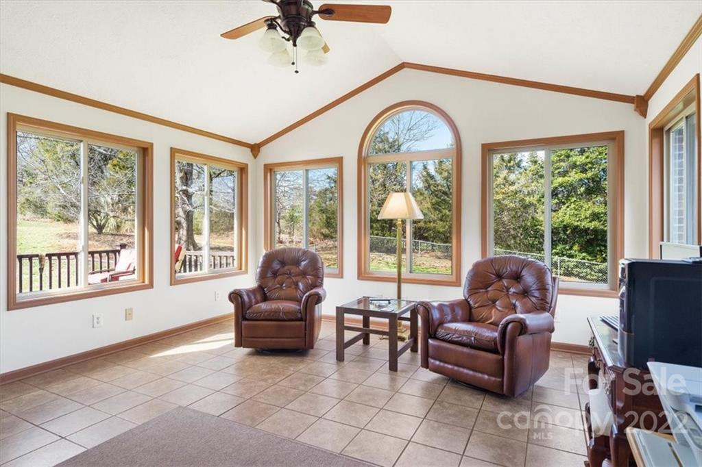 1552 Allen Lane Conover, NC 28613 - Photo 9 of 38 a living room with furniture and floor to ceiling windows