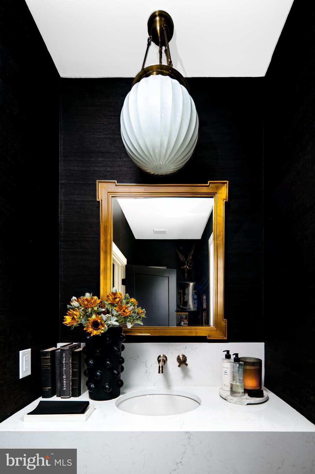 4 Timber Mill Lane, Unit OMBRA Landenberg, PA 19350 - Photo 20 of 33 a bathroom with a sink and mirror