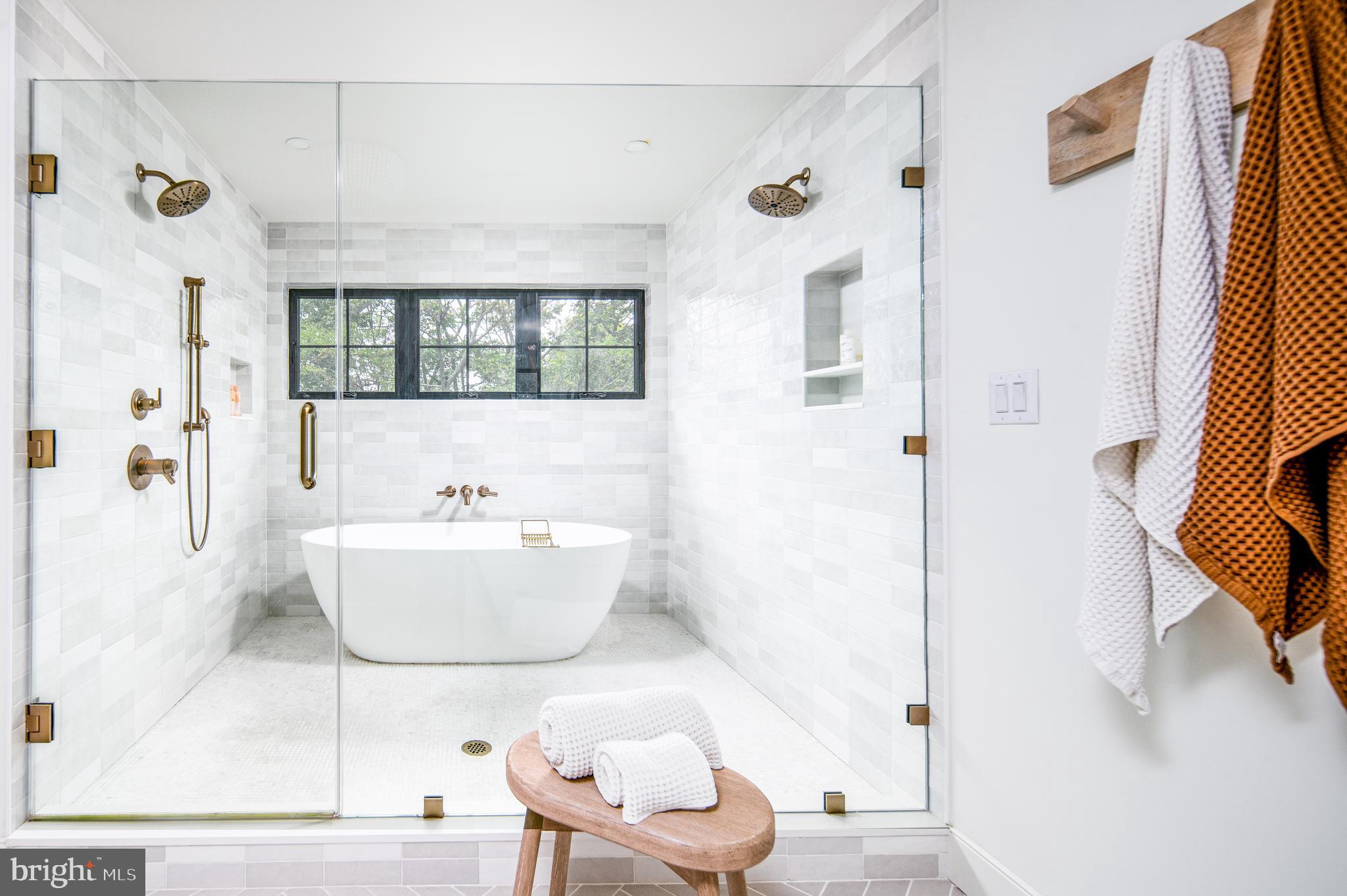 4 Timber Mill Lane, Unit OMBRA Landenberg, PA 19350 - Photo 21 of 33 a bathroom with a bathtub and toilet