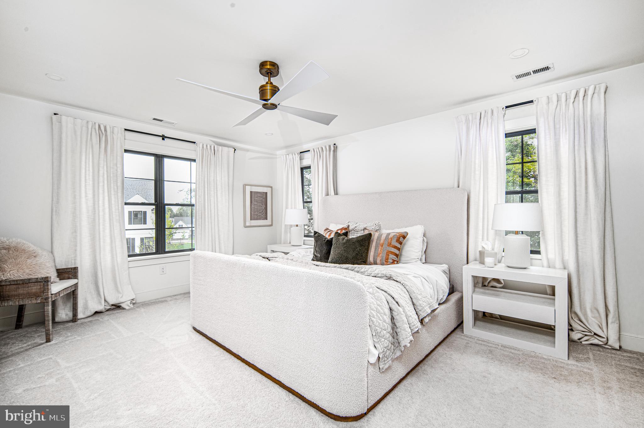 4 Timber Mill Lane, Unit OMBRA Landenberg, PA 19350 - Photo 25 of 33 a bedroom with a large bed and a chandelier