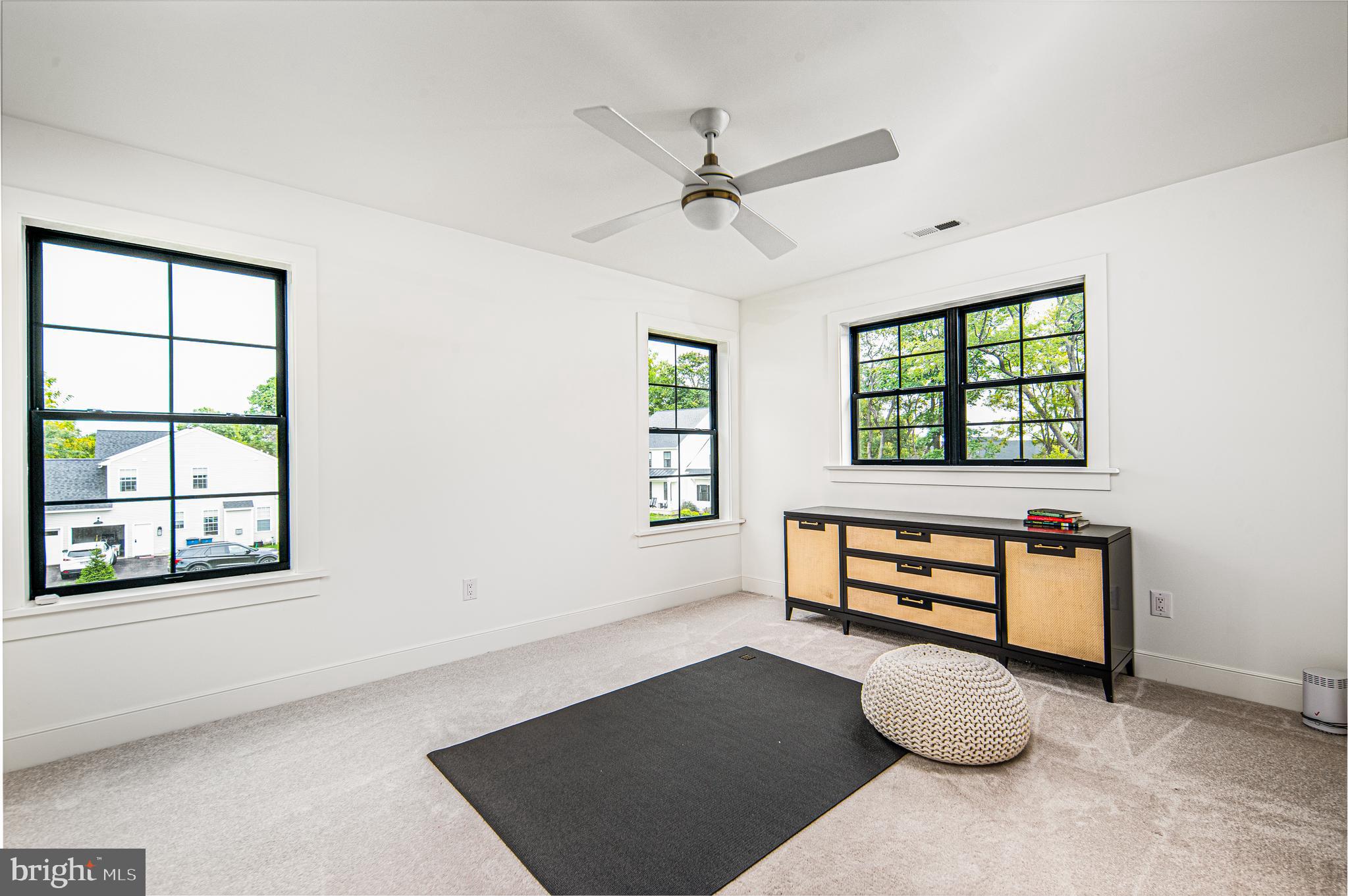 4 Timber Mill Lane, Unit OMBRA Landenberg, PA 19350 - Photo 27 of 33 an empty room with windows and fan