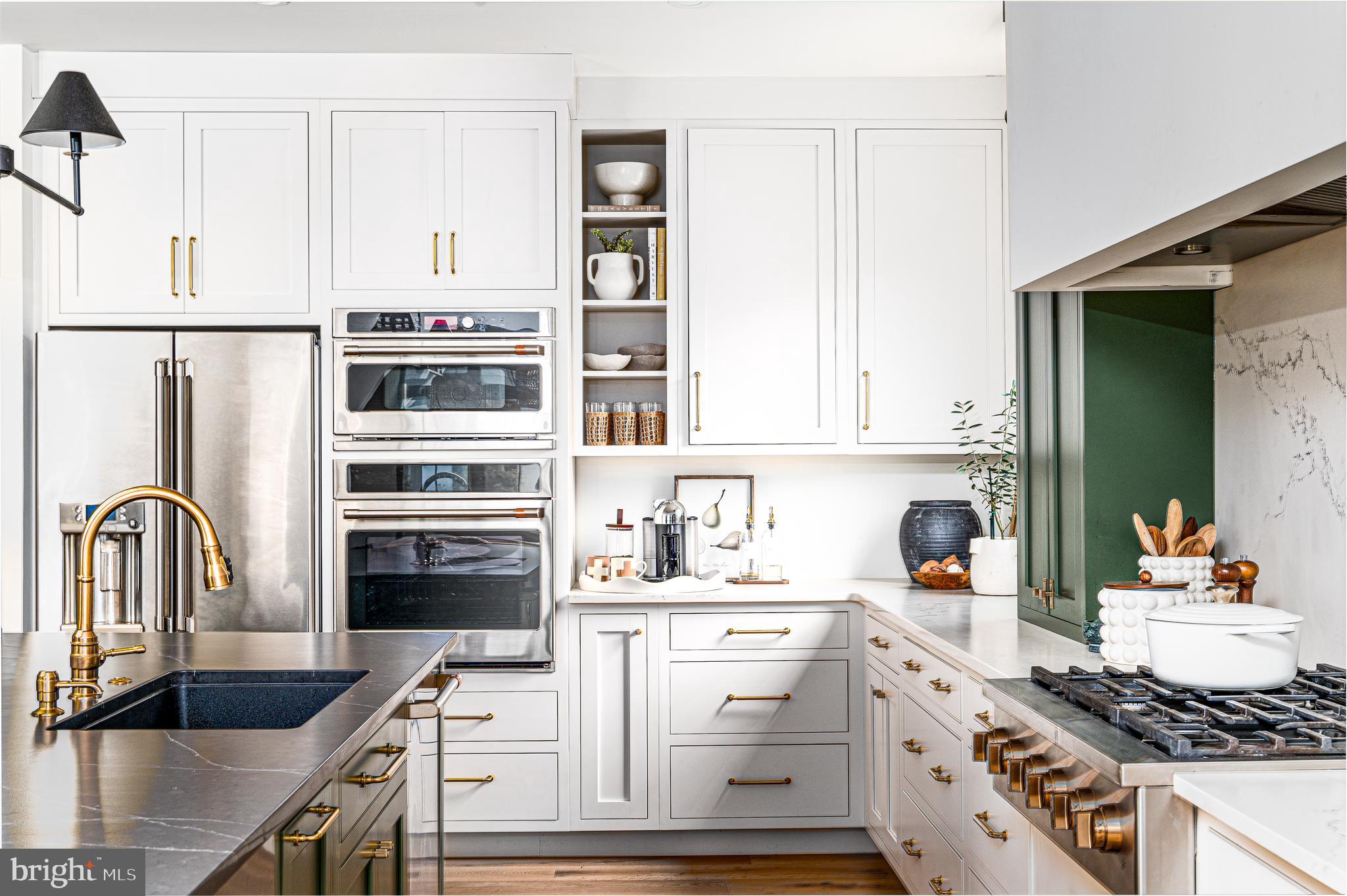 4 Timber Mill Lane, Unit OMBRA Landenberg, PA 19350 - Photo 6 of 33 a kitchen with a refrigerator stove and sink