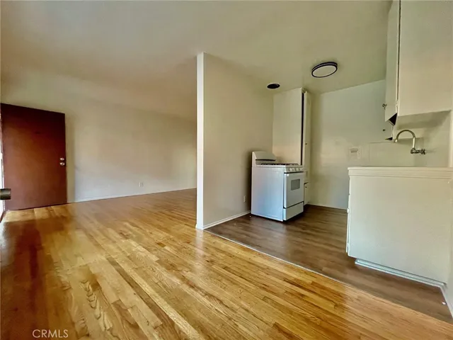 a view of a kitchen with a sink and dishwasher