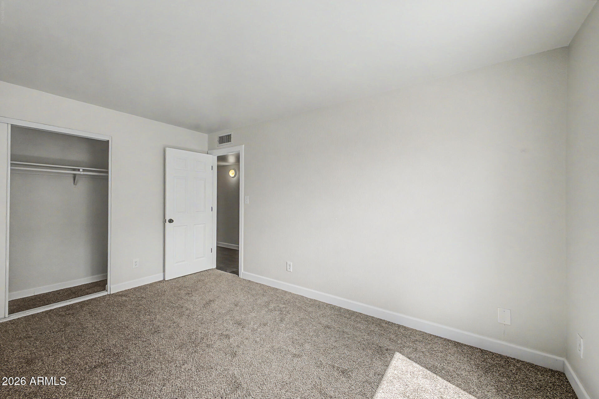 600 South Dobson Road, Unit 177 Mesa, AZ 85202 - Photo 14 of 24 a view of an empty room and closet area