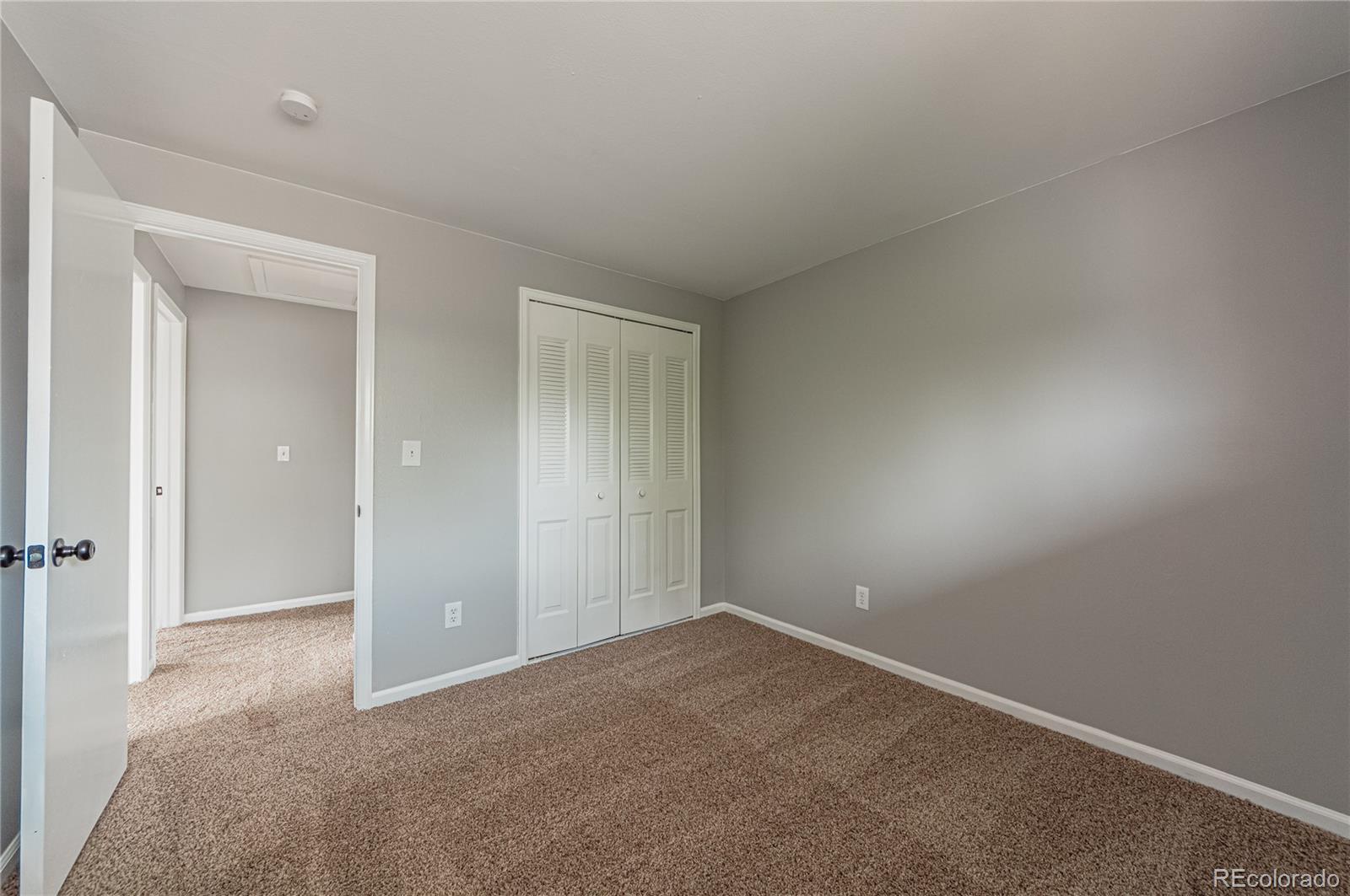 10091 Yates Street Westminster, CO 80031 - Photo 29 of 40 an empty room with a natural light
