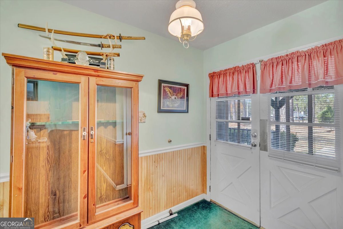 1702 Vada Road Bainbridge, GA 39817 - Photo 14 of 33 a view of a hallway with entryway front door