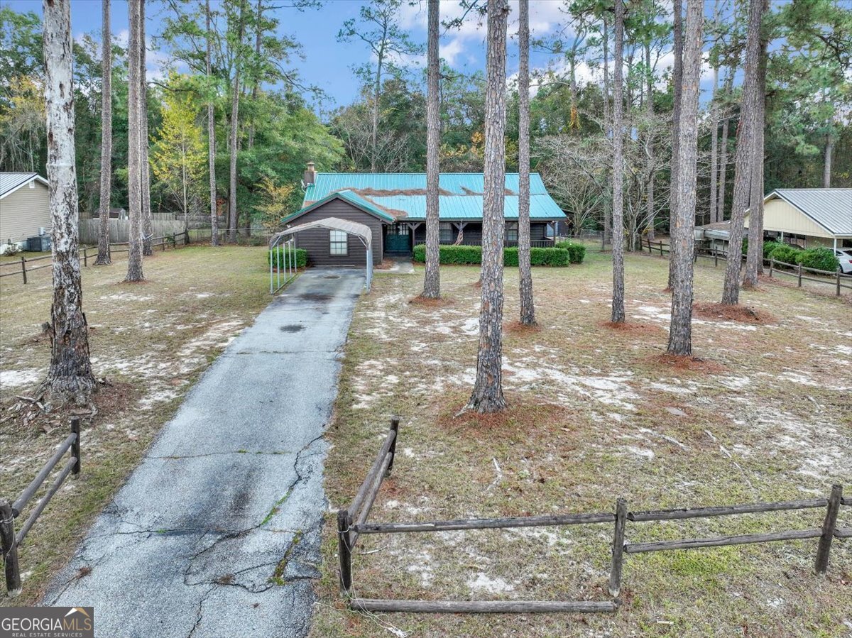 1702 Vada Road Bainbridge, GA 39817 - Photo 3 of 33 a view of a park with a slide