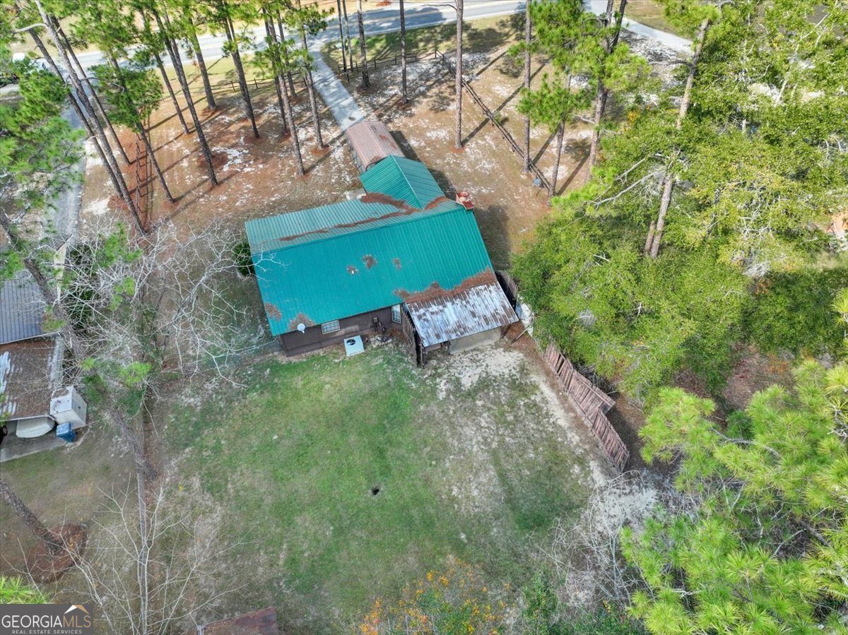 1702 Vada Road Bainbridge, GA 39817 - Photo 33 of 33 a green field with trees in the background