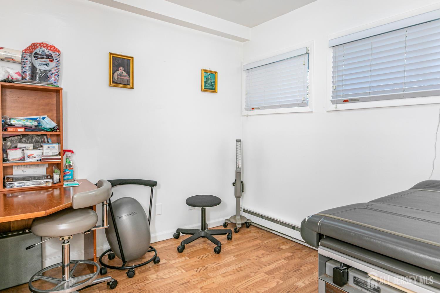 3 Stanworth Road Kendall Park, NJ 08824 - Photo 11 of 22 a view of a workspace with furniture and a window