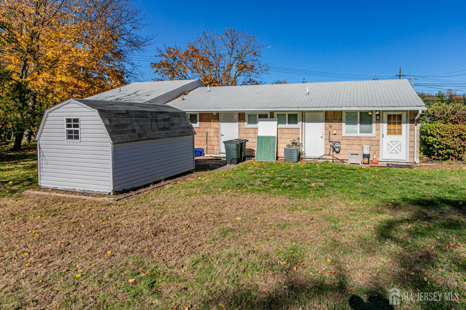 3 Stanworth Road Kendall Park, NJ 08824 - Photo 14 of 22 a front view of a house with a yard