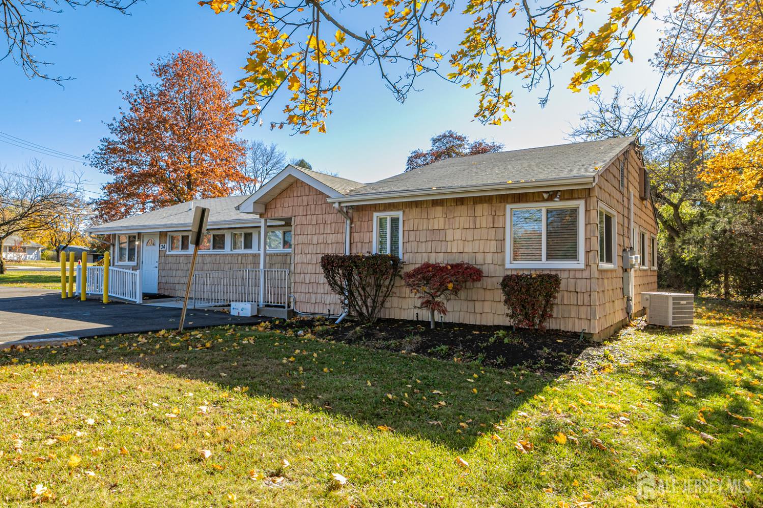 3 Stanworth Road Kendall Park, NJ 08824 - Photo 22 of 22 a house view with a garden space