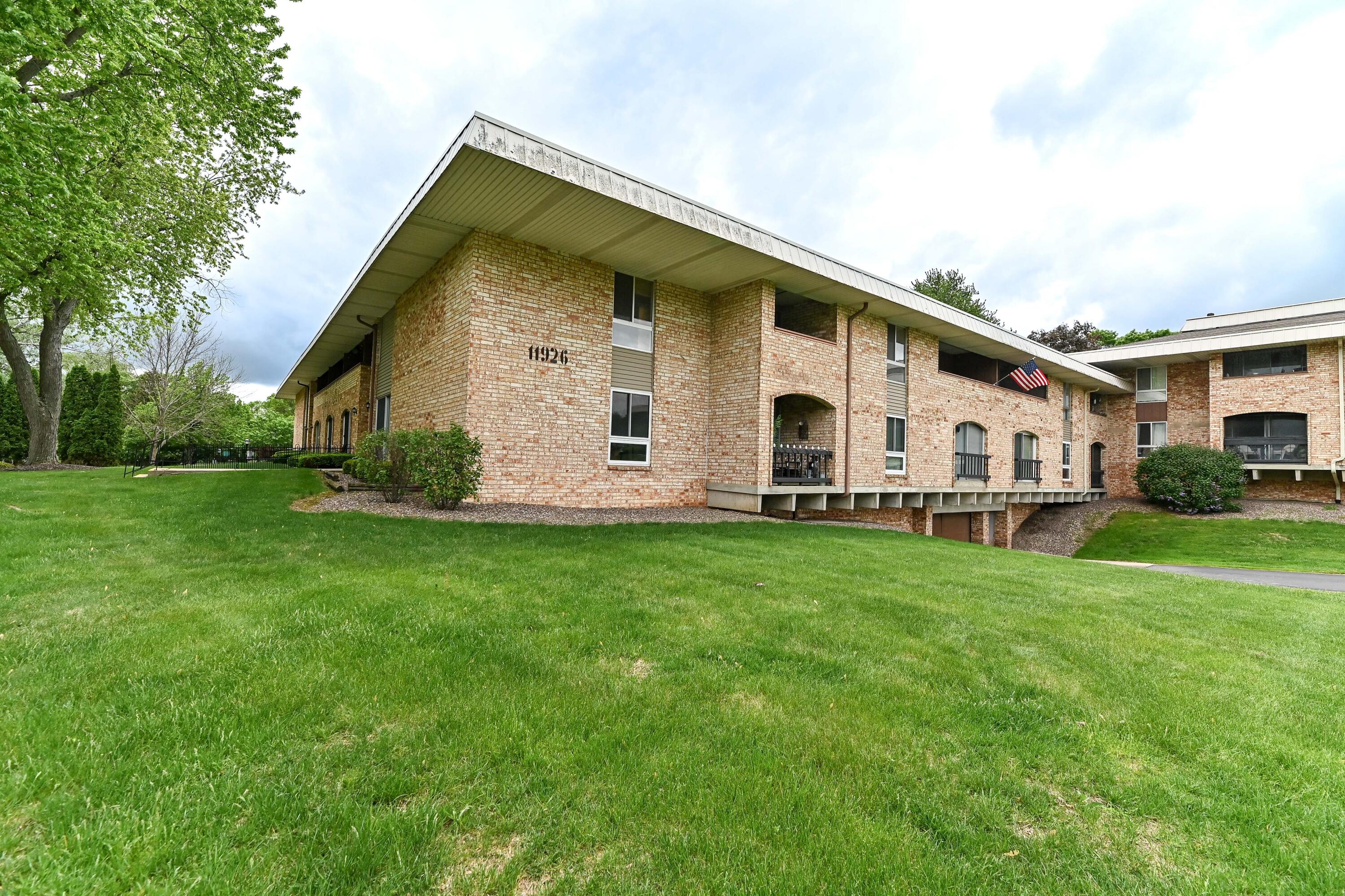 11926 West Mill Road, Unit 4 Milwaukee, WI 53225 - Photo 2 of 40 Exterior of building- All brick!