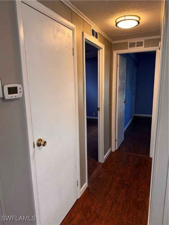 15550 Burnt Store Road, Unit 228 Punta Gorda, FL 33955 - Photo 16 of 40 a view of a hallway with wooden floor and closet