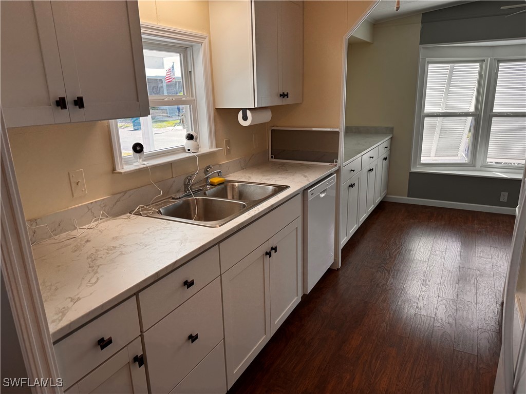15550 Burnt Store Road, Unit 228 Punta Gorda, FL 33955 - Photo 2 of 40 a kitchen with sink and cabinets