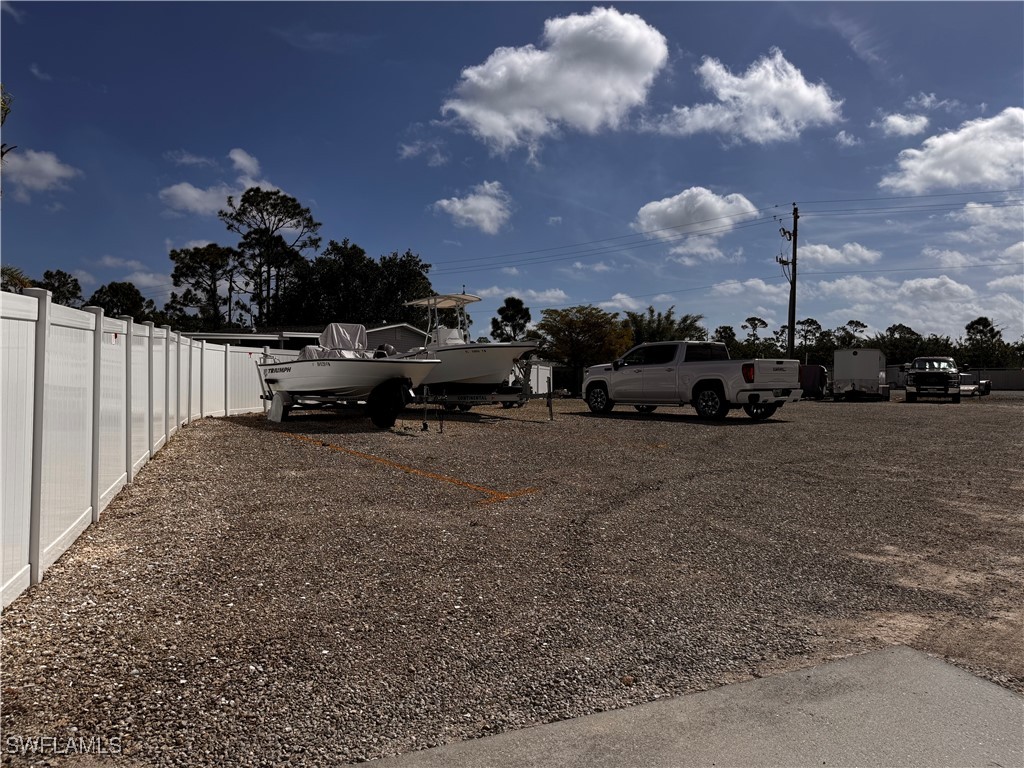15550 Burnt Store Road, Unit 228 Punta Gorda, FL 33955 - Photo 23 of 40 a view of car parked on the side of the road