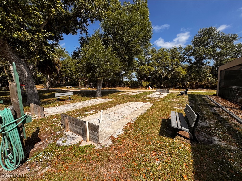 15550 Burnt Store Road, Unit 228 Punta Gorda, FL 33955 - Photo 29 of 40 a view of a swimming pool with a patio