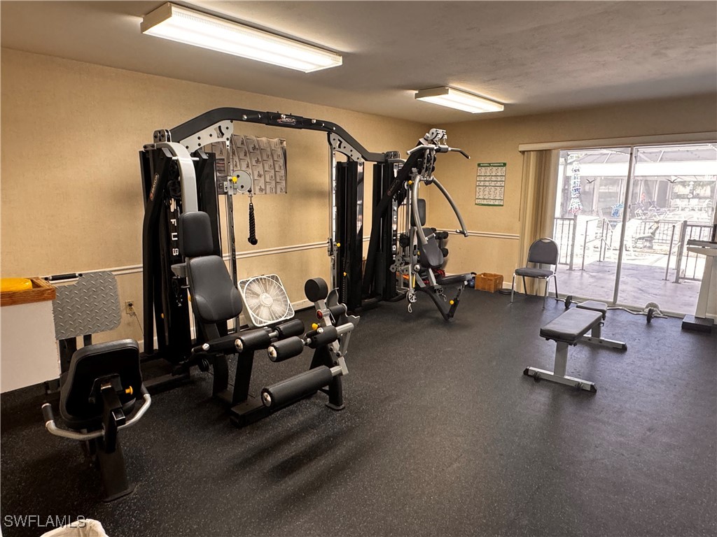 15550 Burnt Store Road, Unit 228 Punta Gorda, FL 33955 - Photo 33 of 40 a view of a room with gym equipment