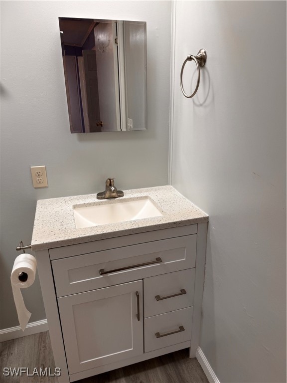 15550 Burnt Store Road, Unit 228 Punta Gorda, FL 33955 - Photo 10 of 40 a bathroom with a sink and a mirror
