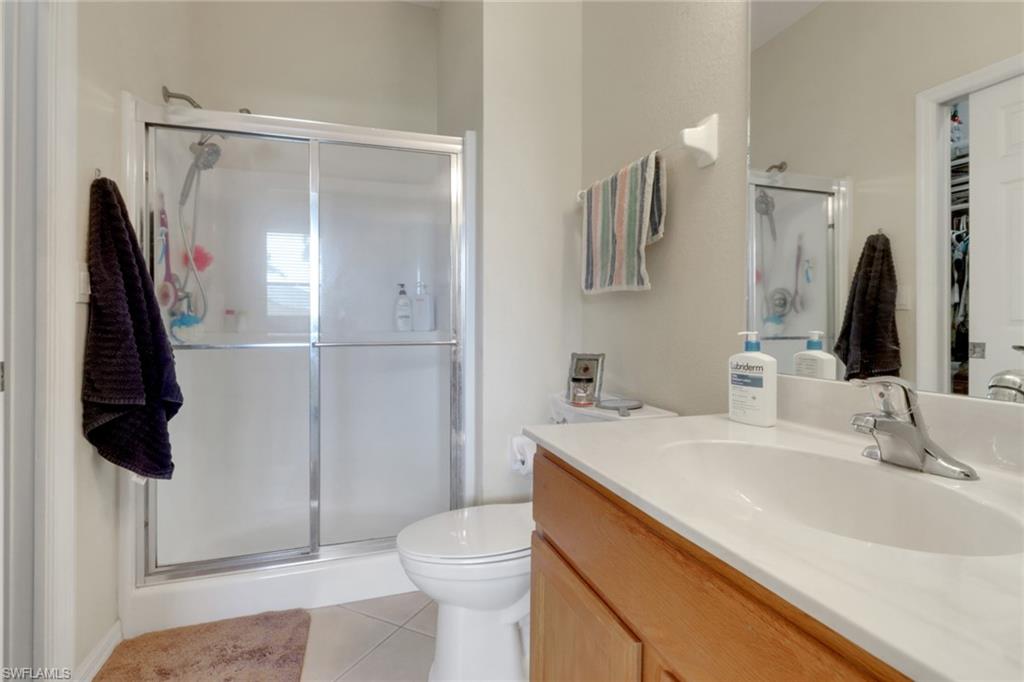 14174 Danpark Loop Fort Myers, FL 33912 - Photo 15 of 20 a bathroom with a sink toilet and shower