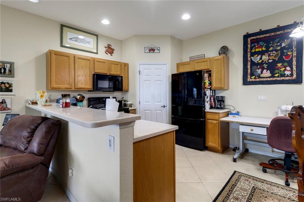 14174 Danpark Loop Fort Myers, FL 33912 - Photo 5 of 20 a living room with furniture and a flat screen tv