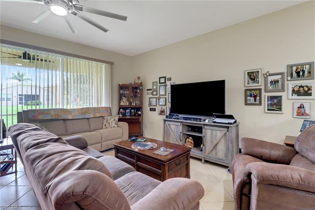 14174 Danpark Loop Fort Myers, FL 33912 - Photo 8 of 20 a living room with furniture and a flat screen tv