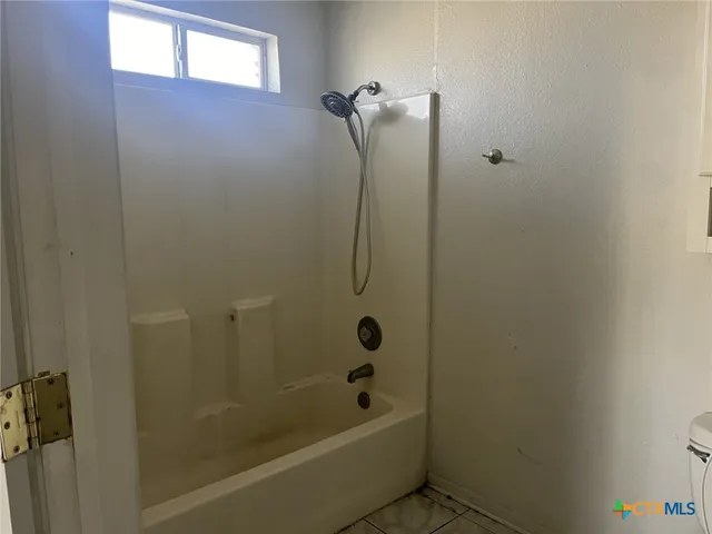 a bathroom with a bathtub