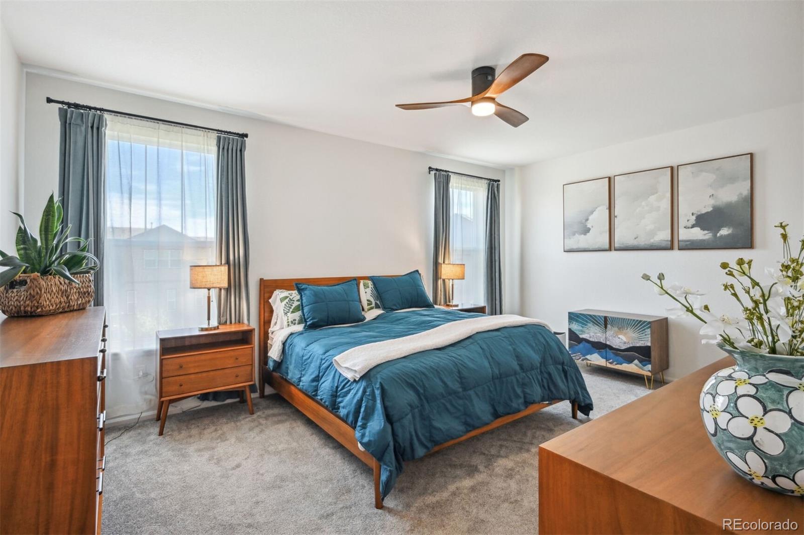 347 Felicity Loop Castle Rock, CO 80109 - Photo 12 of 28 a bedroom with bed and window