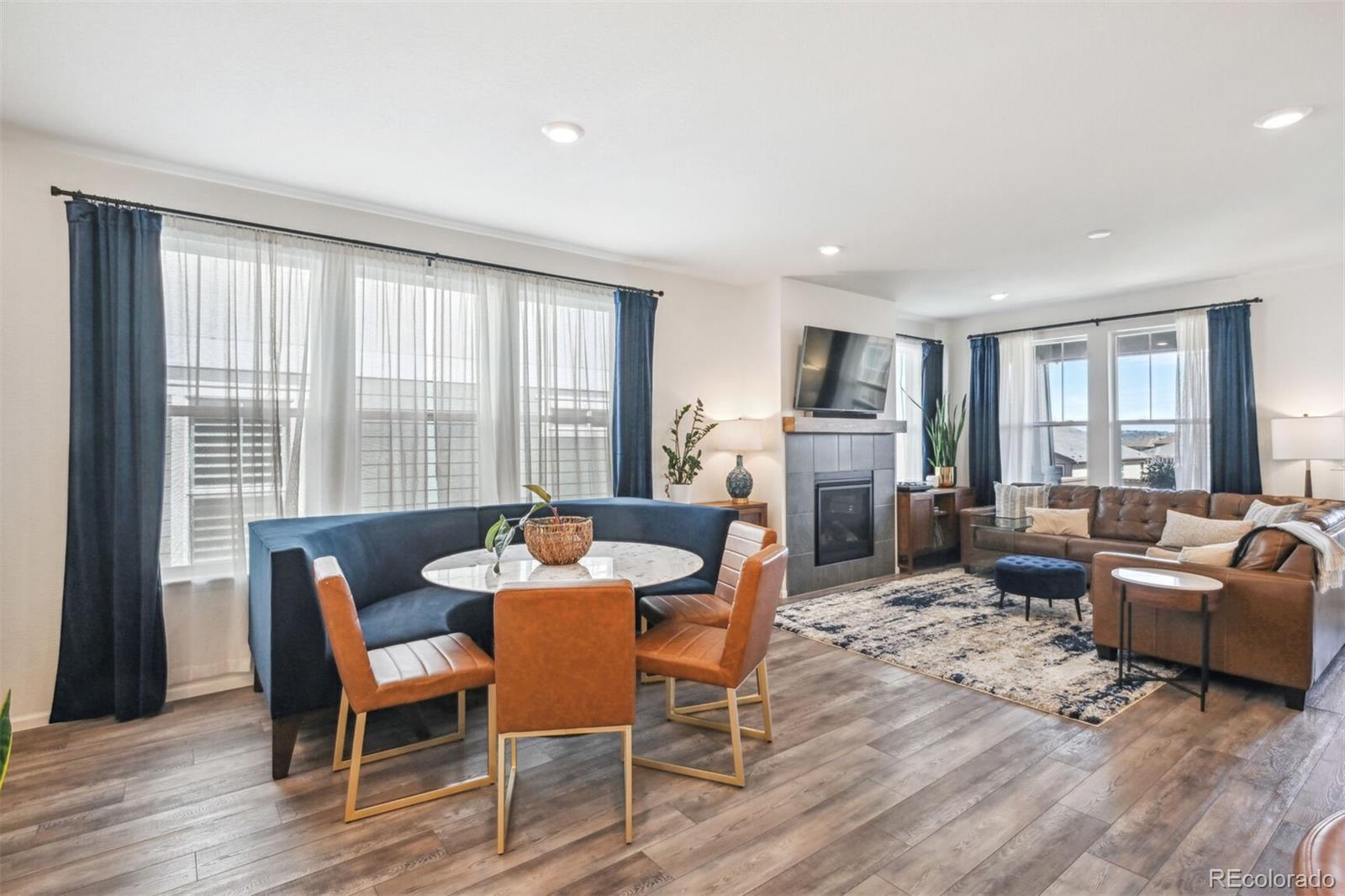 347 Felicity Loop Castle Rock, CO 80109 - Photo 2 of 28 a living room with furniture and a large window