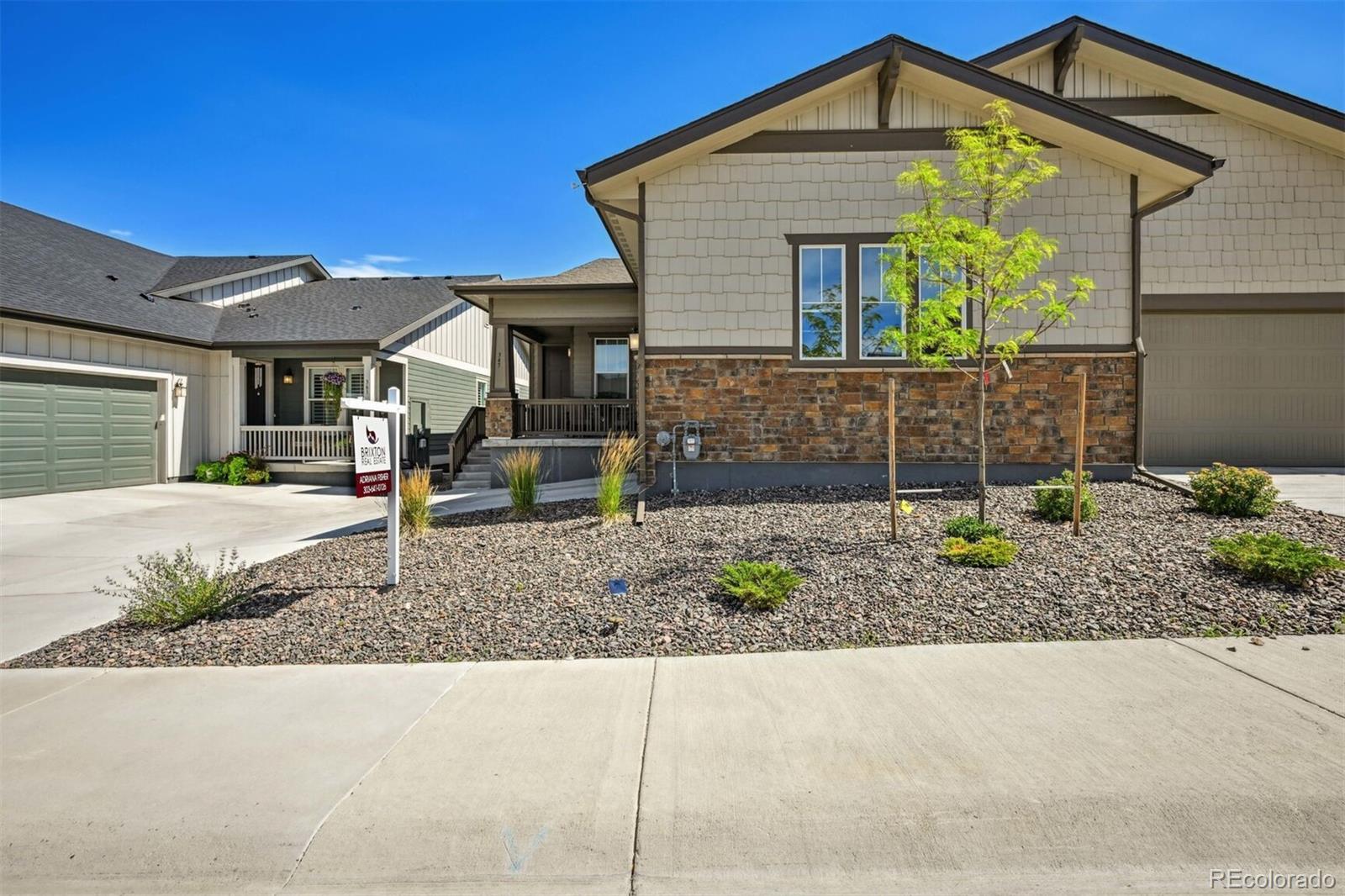 347 Felicity Loop Castle Rock, CO 80109 - Photo 28 of 28 a front view of a house with garden