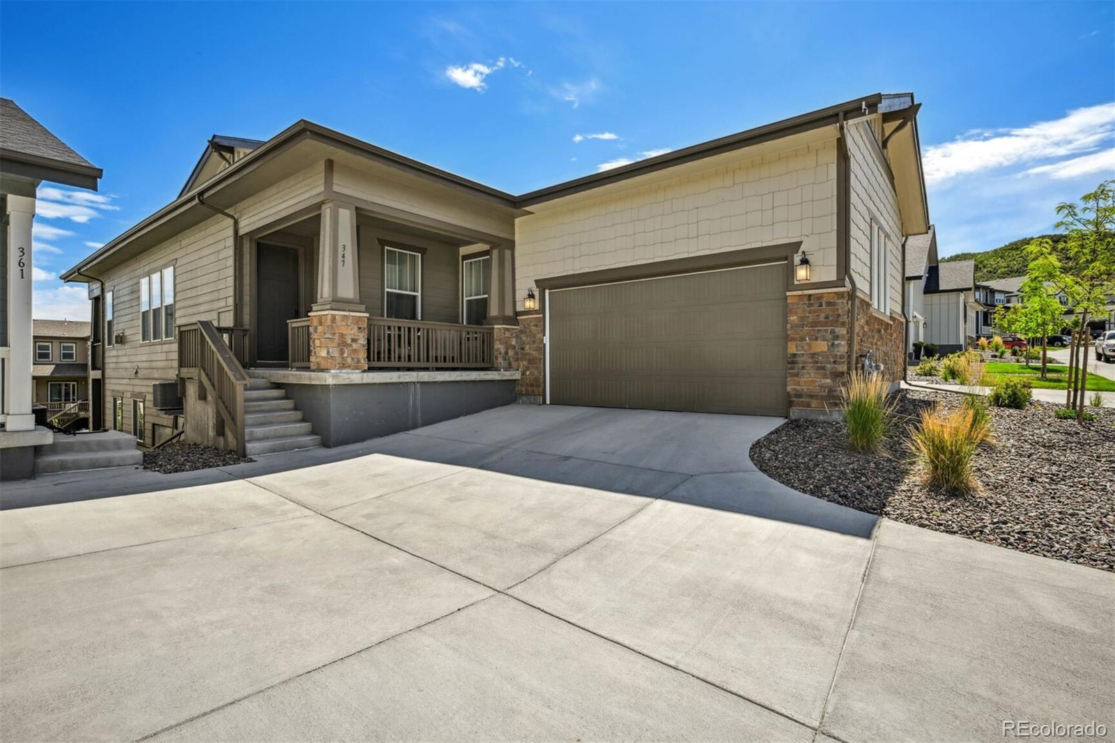 347 Felicity Loop Castle Rock, CO 80109 - Photo 4 of 28 a front view of a house with garage