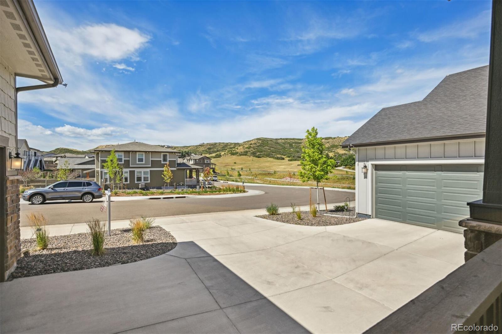347 Felicity Loop Castle Rock, CO 80109 - Photo 5 of 28 a view of a terrace with skyline