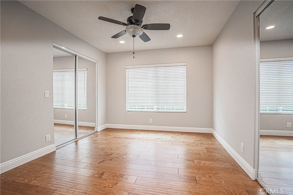 1301 Eltham Place Fullerton, CA 92833 - Photo 20 of 26 wooden floor in an empty room with a window