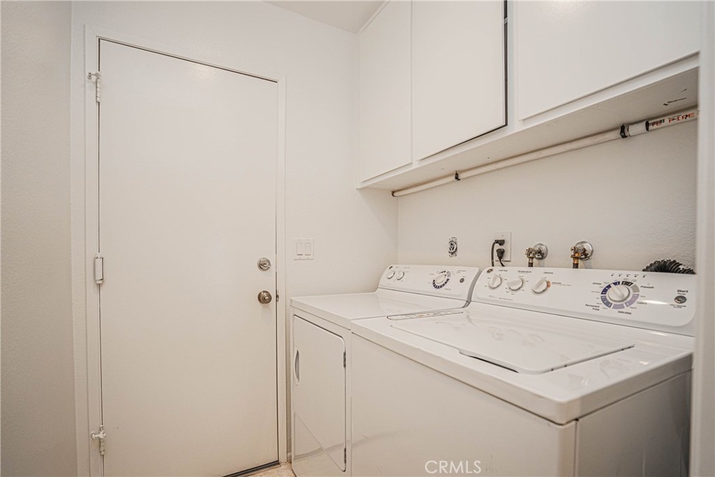 1301 Eltham Place Fullerton, CA 92833 - Photo 21 of 26 a utility room with dryer and washer
