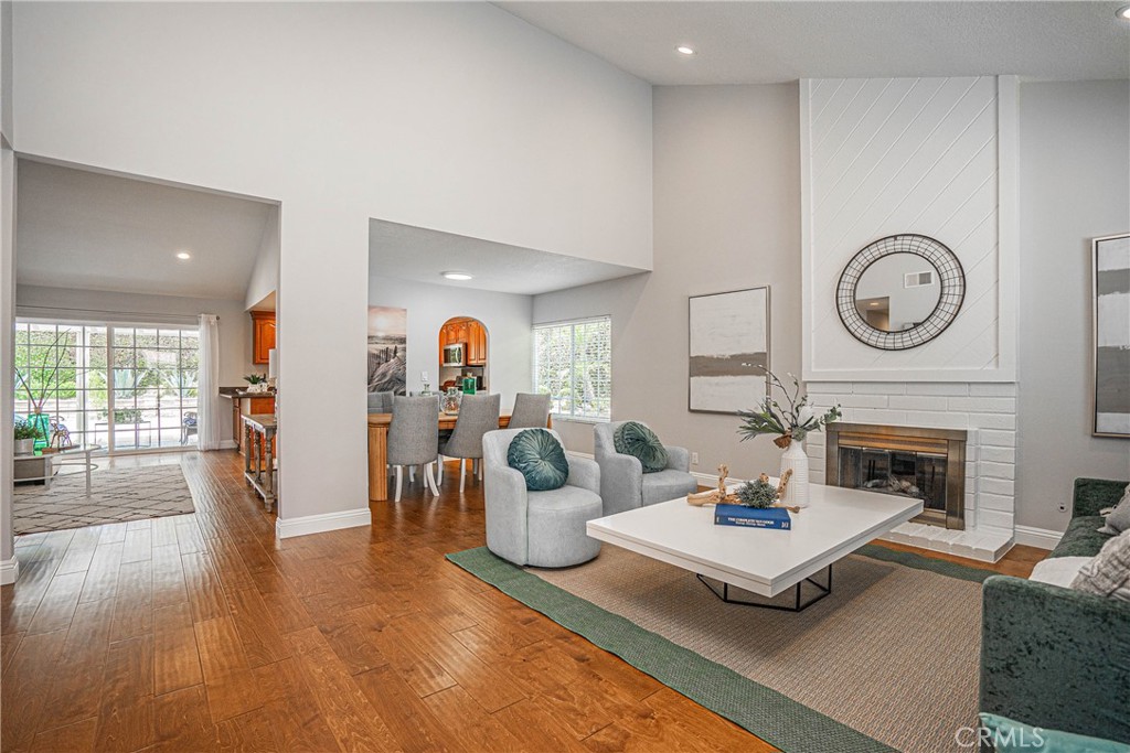 1301 Eltham Place Fullerton, CA 92833 - Photo 3 of 26 a living room with furniture and a fireplace