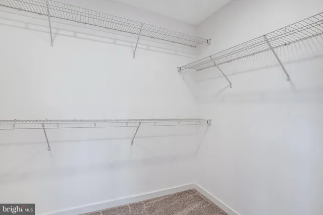 a view of empty room with windows