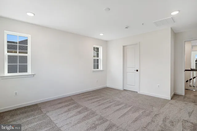 a bathroom with a sink vanity and mirror