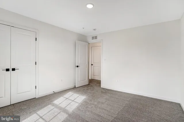 a bathroom with a shower and a bath tub