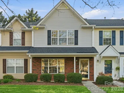 a front view of a house having yard