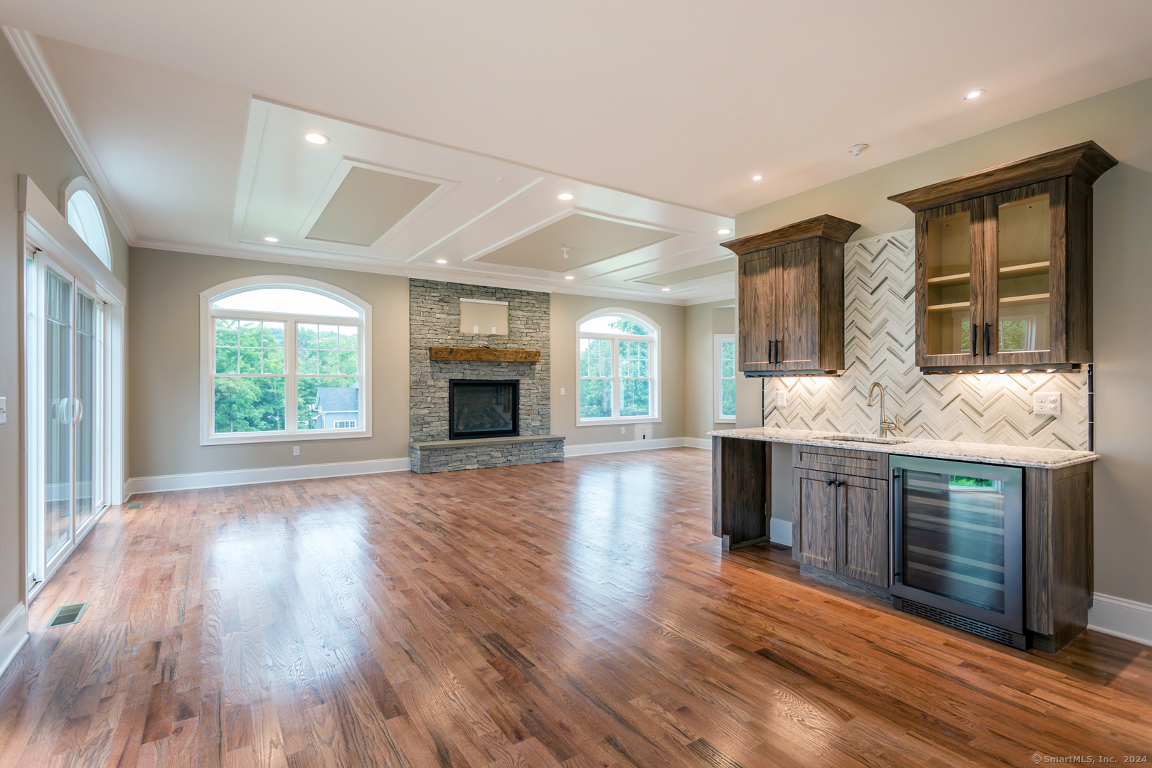 18 Sebastian Trail Newtown, CT 06470 - Photo 12 of 22 a large kitchen with stainless steel appliances granite countertop a stove and a wooden floors