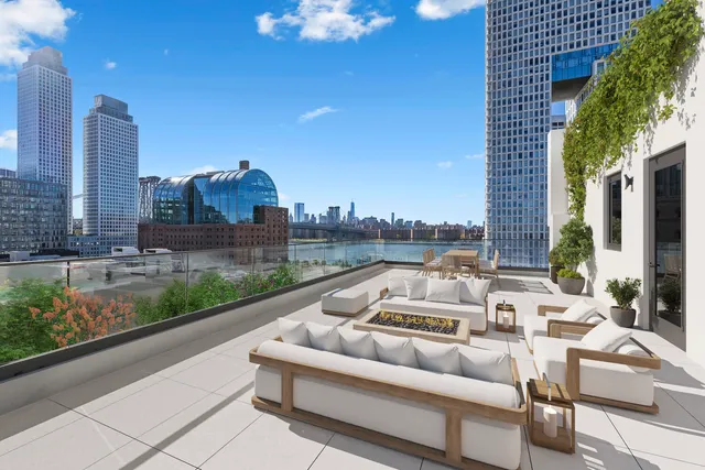 a view of roof deck with patio