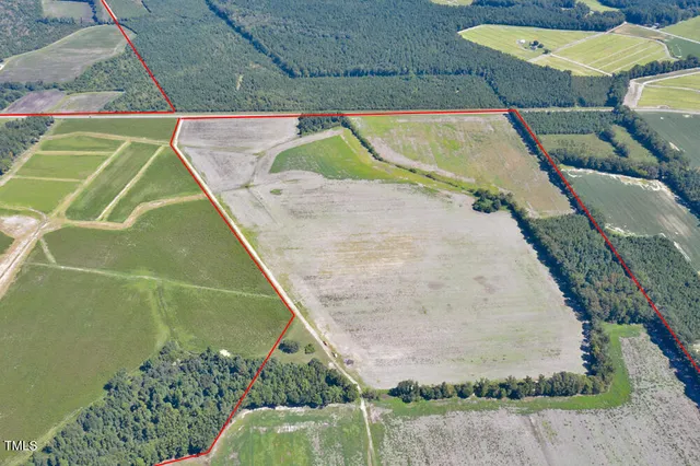 a view of lake with a yard