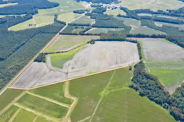 a view of a lake with a yard