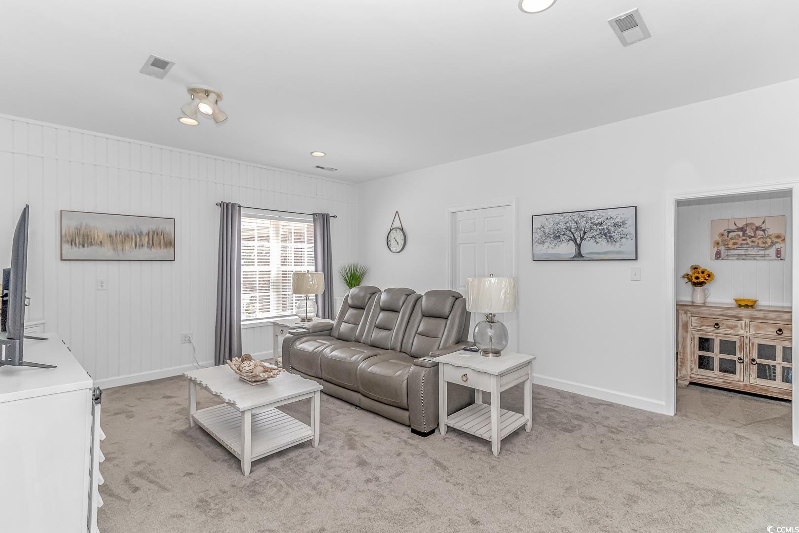 3286 State Rd S-26-777 Loris, SC 29569 - Photo 32 of 40 Living room featuring light carpet