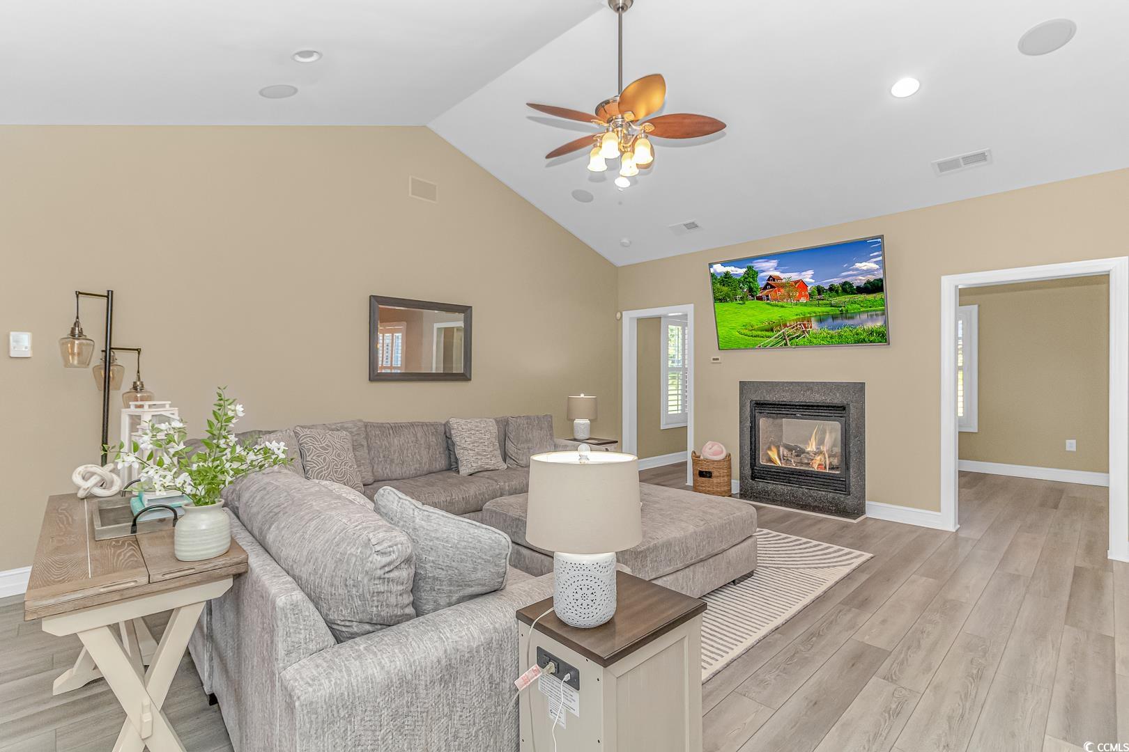 3286 State Rd S-26-777 Loris, SC 29569 - Photo 6 of 40 Living room with light wood-type flooring, a multi