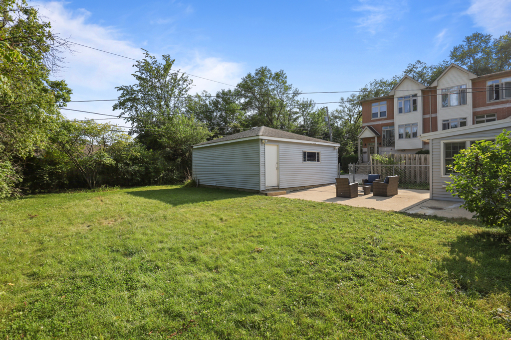 7125 Simpson Street Morton Grove, IL 60053 - Photo 33 of 33 a house view with a garden space