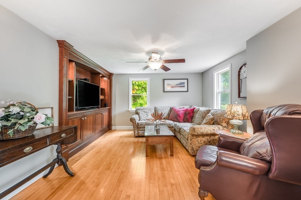 2470 West Street Wrentham, MA 02093 - Photo 14 of 42 a living room with furniture and a flat screen tv