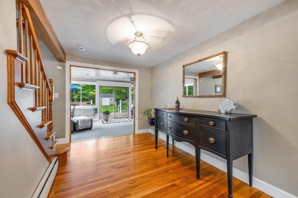 2470 West Street Wrentham, MA 02093 - Photo 19 of 42 a living room with furniture and a wooden floor