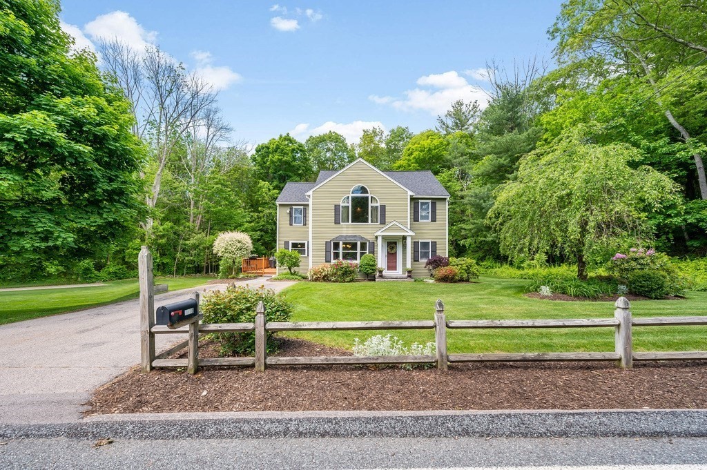 2470 West Street Wrentham, MA 02093 - Photo 2 of 42 a front view of a house with a yard